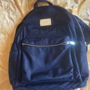 Michael kors backpack, a little stained but i haven’t even tried to clean it